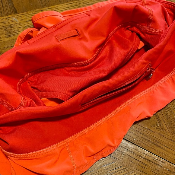 Lululemon Shorts • Size 4 • Two toned, red and orange/pink with back zipper - Picture 9 of 10